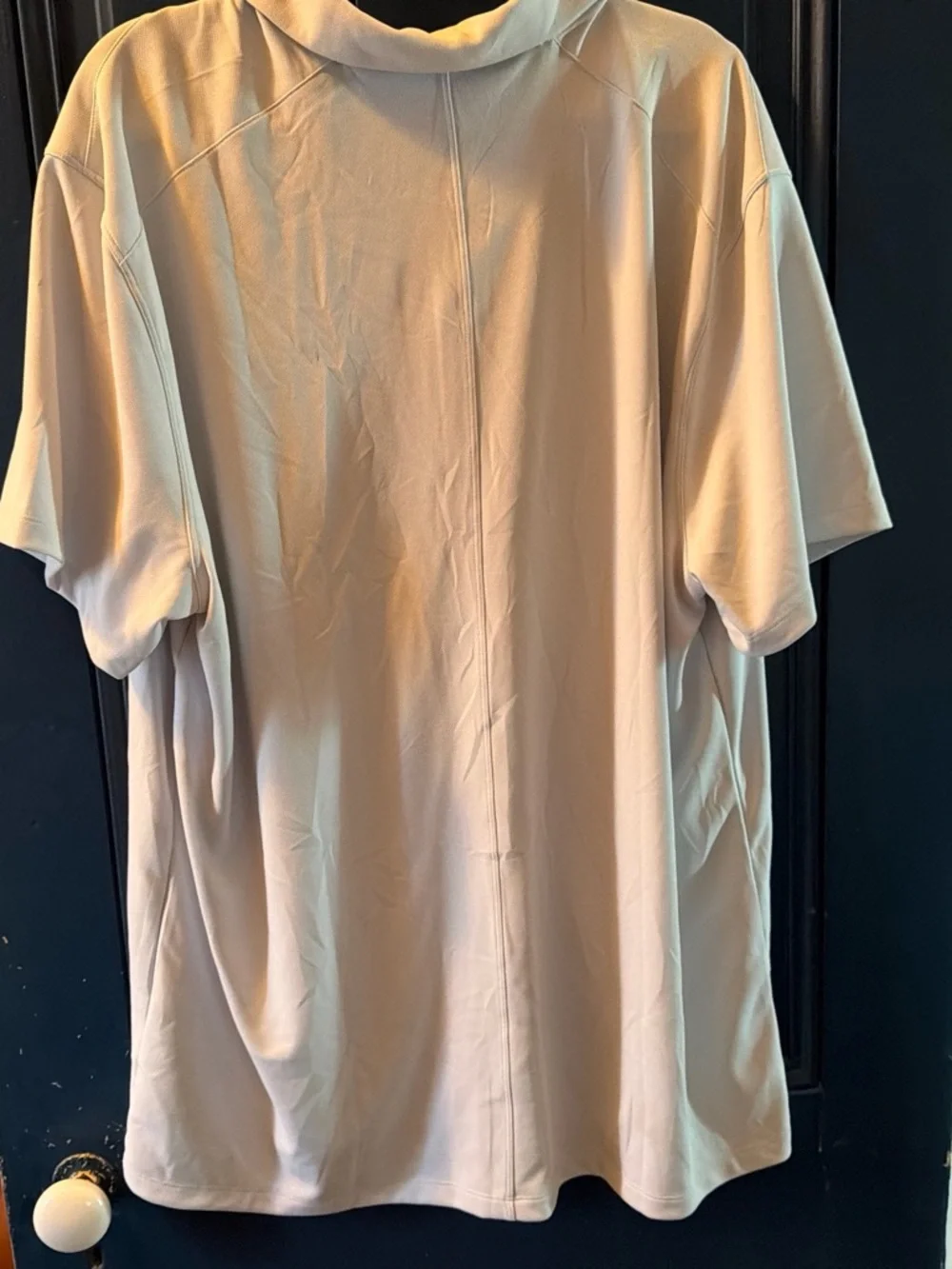 Nike Men’s Light gray Polo with Black Swoosh